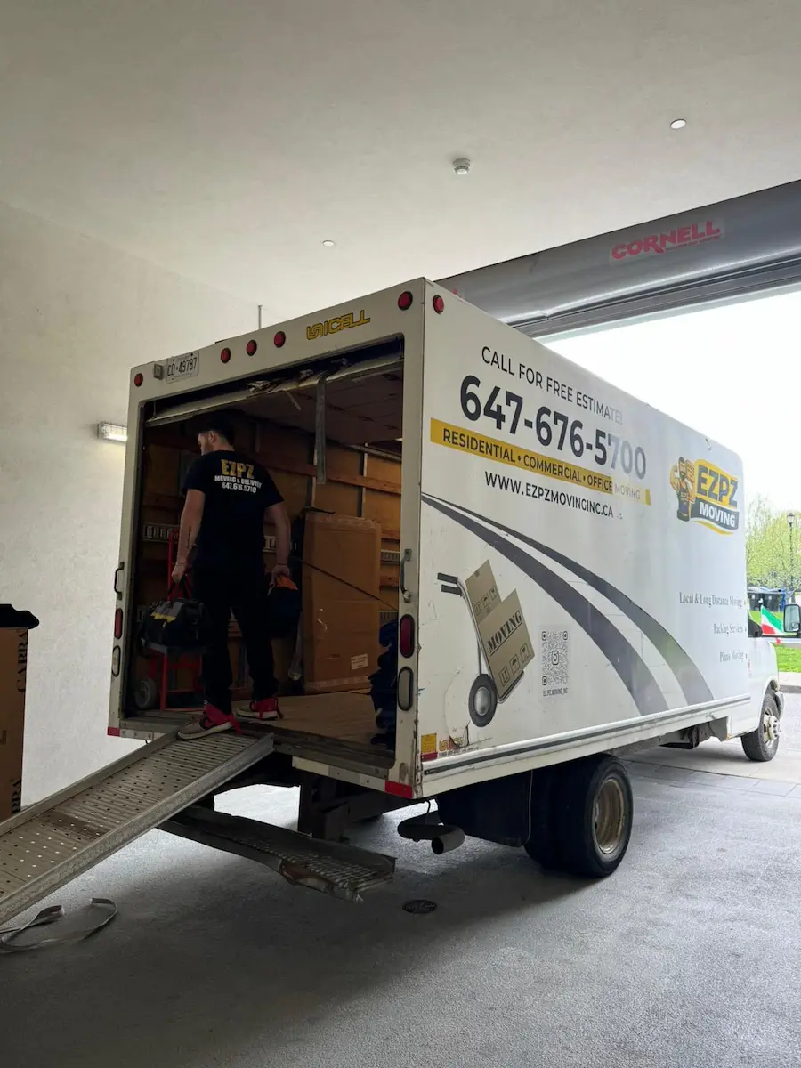 Long distance movers loading a moving truck in Toronto